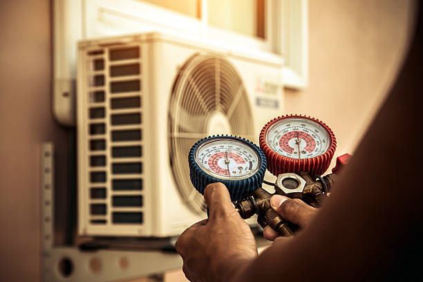 Professional Ac Installation technician working in South Walpole, MA